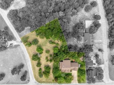 This beautifully maintained brick home is in a quite tree-shaded on White Bluff Resort - Old Course in Texas - for sale on GolfHomes.com, golf home, golf lot