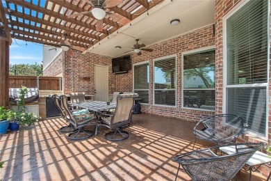 Welcome to this beautifully crafted residence nestled in the on Hackberry Creek Country Club in Texas - for sale on GolfHomes.com, golf home, golf lot