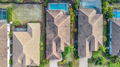 Experience resort-style living in this beautiful White Star on Boca Royale Golf and Country Club in Florida - for sale on GolfHomes.com, golf home, golf lot