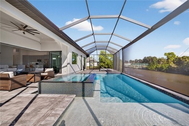 PRIME WATERFRONT IN CAPE CORAL! CONTEMPORARY 3 BEDROOM PLUS DEN on Burnt Store Golf Club in Florida - for sale on GolfHomes.com, golf home, golf lot