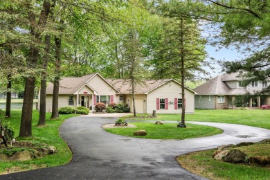 Welcome to your dream home in Canadian Lakes, perfectly situated on Canadian Lakes Country Club-The Royal Course in Michigan - for sale on GolfHomes.com, golf home, golf lot
