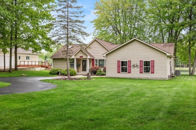 Welcome to your dream home in Canadian Lakes, perfectly situated on Canadian Lakes Country Club-The Royal Course in Michigan - for sale on GolfHomes.com, golf home, golf lot