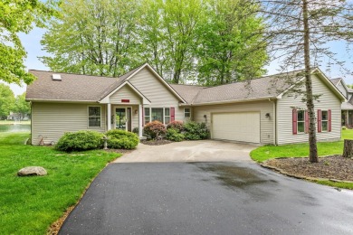 Welcome to your dream home in Canadian Lakes, perfectly situated on Canadian Lakes Country Club-The Royal Course in Michigan - for sale on GolfHomes.com, golf home, golf lot
