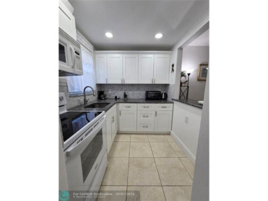 Beautiful Leisureville Condo 55+ community. 1st Floor No Land on Leisureville Community Association in Florida - for sale on GolfHomes.com, golf home, golf lot