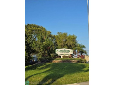 Beautiful Leisureville Condo 55+ community. 1st Floor No Land on Leisureville Community Association in Florida - for sale on GolfHomes.com, golf home, golf lot