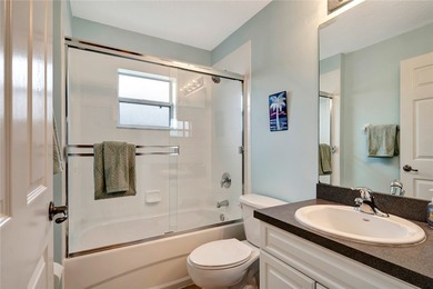 Welcome to this beachy home! Perfectly maintained 3 bed, 2 bath on Indian River Club in Florida - for sale on GolfHomes.com, golf home, golf lot