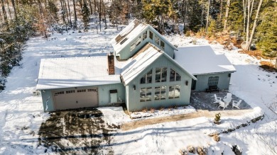 Contemporary 3-bedroom, 2.5-bath home situated on 1+ acres in on Eastman Golf Links in New Hampshire - for sale on GolfHomes.com, golf home, golf lot