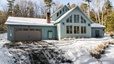 Contemporary 3-bedroom, 2.5-bath home situated on 1+ acres in on Eastman Golf Links in New Hampshire - for sale on GolfHomes.com, golf home, golf lot