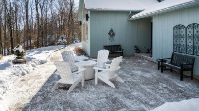 Contemporary 3-bedroom, 2.5-bath home situated on 1+ acres in on Eastman Golf Links in New Hampshire - for sale on GolfHomes.com, golf home, golf lot