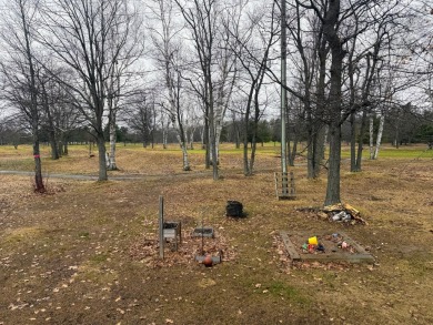 Spacious and beautifully updated duplex featuring 3 bedrooms and on The Oaks At Kincheloe in Michigan - for sale on GolfHomes.com, golf home, golf lot
