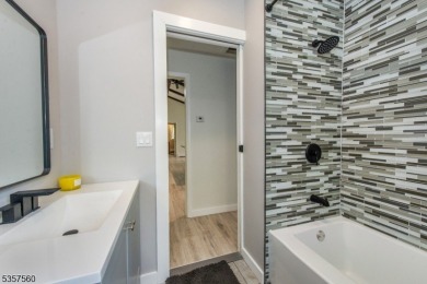 Summer living awaits in this beautifully renovated open concept on High Point Golf Club in New Jersey - for sale on GolfHomes.com, golf home, golf lot