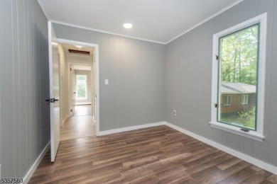 Summer living awaits in this beautifully renovated open concept on High Point Golf Club in New Jersey - for sale on GolfHomes.com, golf home, golf lot