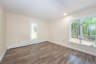 Summer living awaits in this beautifully renovated open concept on High Point Golf Club in New Jersey - for sale on GolfHomes.com, golf home, golf lot