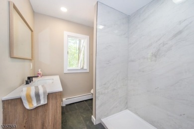 Summer living awaits in this beautifully renovated open concept on High Point Golf Club in New Jersey - for sale on GolfHomes.com, golf home, golf lot