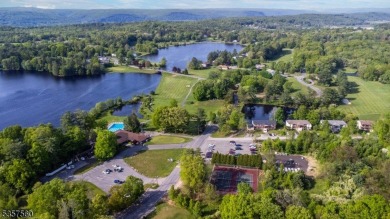 Summer living awaits in this beautifully renovated open concept on High Point Golf Club in New Jersey - for sale on GolfHomes.com, golf home, golf lot