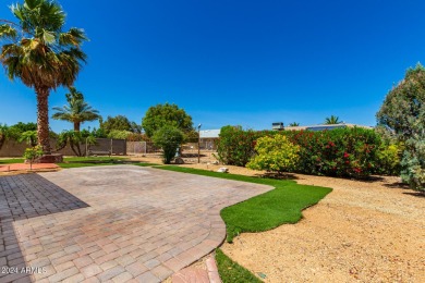 Location, location, LOCATION! Nestled in the heart of Sun City on Stardust Golf Course in Arizona - for sale on GolfHomes.com, golf home, golf lot