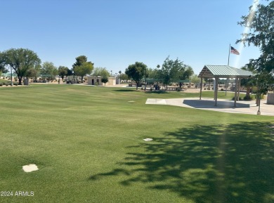 Location, location, LOCATION! Nestled in the heart of Sun City on Stardust Golf Course in Arizona - for sale on GolfHomes.com, golf home, golf lot