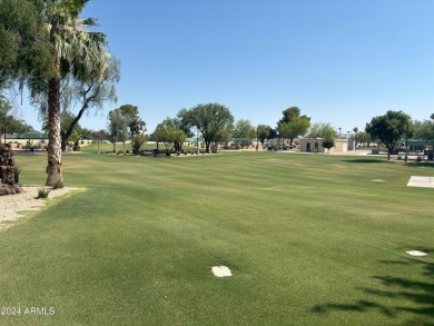 Location, location, LOCATION! Nestled in the heart of Sun City on Stardust Golf Course in Arizona - for sale on GolfHomes.com, golf home, golf lot