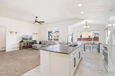 Welcome to this beautifully designed 3-bedroom, 2-bathroom home on Raindance National Golf Course in Colorado - for sale on GolfHomes.com, golf home, golf lot