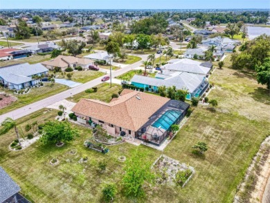 UPDATED, LARGE POOL, DOUBLE LOT, LAKE VIEW AND FULLY FURNISHED on Deep Creek Golf Club in Florida - for sale on GolfHomes.com, golf home, golf lot