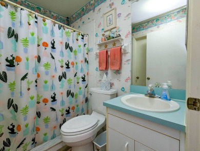 This 2 bedroom 2 bath villa offers the perfect winter retreat on The Great Outdoors Golf and Country Club in Florida - for sale on GolfHomes.com, golf home, golf lot
