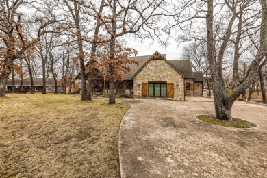 Lovely one-level custom built waterfront home situated on over a on Patricia Island Golf Club in Oklahoma - for sale on GolfHomes.com, golf home, golf lot