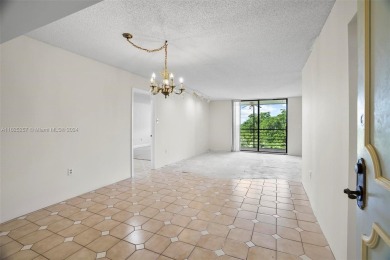 Two-bedroom, two-bathroom condominium. HOA Includes water, trash on Pembroke Lakes Golf Club in Florida - for sale on GolfHomes.com, golf home, golf lot