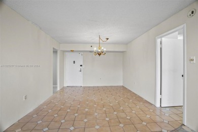 Two-bedroom, two-bathroom condominium. HOA Includes water, trash on Pembroke Lakes Golf Club in Florida - for sale on GolfHomes.com, golf home, golf lot