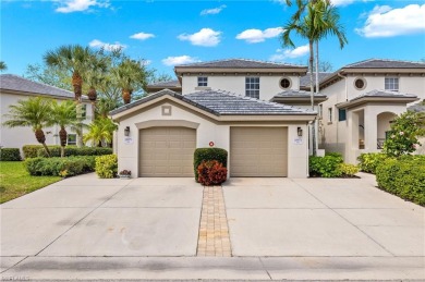 This 2nd floor end unit coach home is located just around the on Pelican Sound Golf and River Club in Florida - for sale on GolfHomes.com, golf home, golf lot
