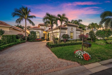 This tranquil retreat nestled within The Country Club at Mirasol on Country Club At Mirasol in Florida - for sale on GolfHomes.com, golf home, golf lot