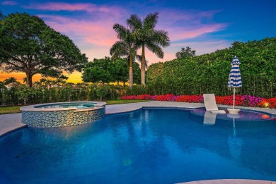 This tranquil retreat nestled within The Country Club at Mirasol on Country Club At Mirasol in Florida - for sale on GolfHomes.com, golf home, golf lot