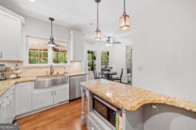 Nestled on a quiet, .38-acre cul-de-sac lot in the highly on Canongate At Eagle Watch Golf Club in Georgia - for sale on GolfHomes.com, golf home, golf lot