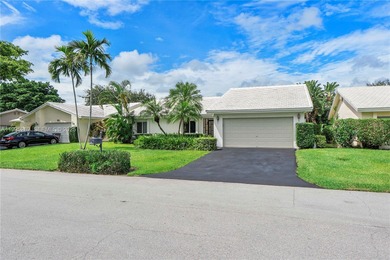 Discover Paradise. Beautifully renovated home, ideally located on The Country Club At Boca Raton in Florida - for sale on GolfHomes.com, golf home, golf lot