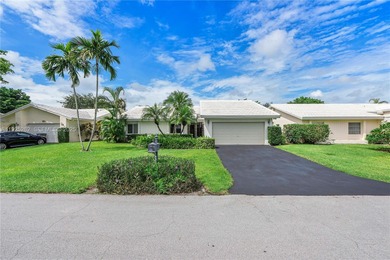 Discover Paradise. Beautifully renovated home, ideally located on The Country Club At Boca Raton in Florida - for sale on GolfHomes.com, golf home, golf lot