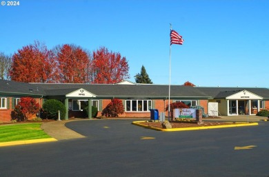 This home features an open floor plan with a view of two golf on Senior Estates Golf and Country Club in Oregon - for sale on GolfHomes.com, golf home, golf lot