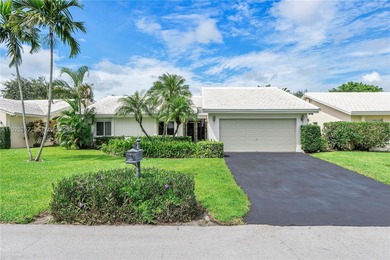 Discover Paradise. Beautifully renovated home, ideally located on The Country Club At Boca Raton in Florida - for sale on GolfHomes.com, golf home, golf lot