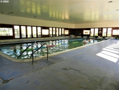 This home features an open floor plan with a view of two golf on Senior Estates Golf and Country Club in Oregon - for sale on GolfHomes.com, golf home, golf lot