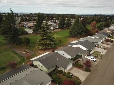 This home features an open floor plan with a view of two golf on Senior Estates Golf and Country Club in Oregon - for sale on GolfHomes.com, golf home, golf lot