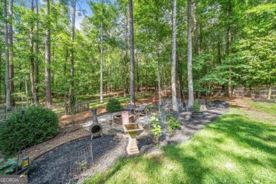 Nestled on a quiet, .38-acre cul-de-sac lot in the highly on Canongate At Eagle Watch Golf Club in Georgia - for sale on GolfHomes.com, golf home, golf lot