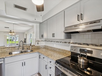 Nestled on the first hole of the Little Course golf course, this on Seven Springs Golf and Country Club in Florida - for sale on GolfHomes.com, golf home, golf lot