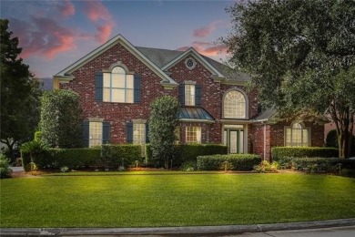 Exquisitely positioned on a desirable corner lot, this elegant on English Turn Golf and Country Club in Louisiana - for sale on GolfHomes.com, golf home, golf lot