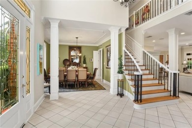 Exquisitely positioned on a desirable corner lot, this elegant on English Turn Golf and Country Club in Louisiana - for sale on GolfHomes.com, golf home, golf lot