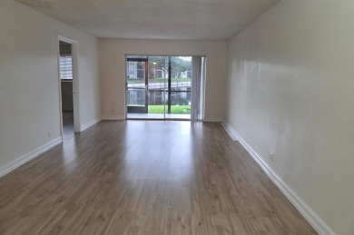 Bright & Spacious Corner Unit with Water Views-Investor on Colony West Country Club in Florida - for sale on GolfHomes.com, golf home, golf lot