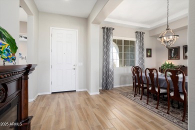 Stunning Endeavor model on the 6th hole of Sun City Festival's on Copper Canyon Golf Club in Arizona - for sale on GolfHomes.com, golf home, golf lot