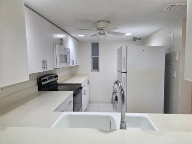 Bright & Spacious Corner Unit with Water Views-Investor on Colony West Country Club in Florida - for sale on GolfHomes.com, golf home, golf lot