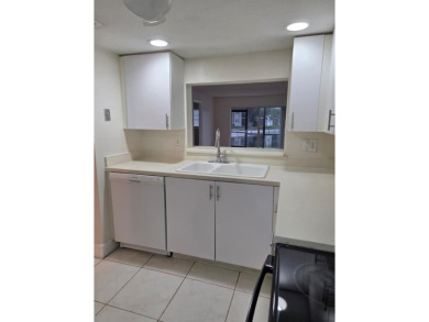 Bright & Spacious Corner Unit with Water Views-Investor on Colony West Country Club in Florida - for sale on GolfHomes.com, golf home, golf lot