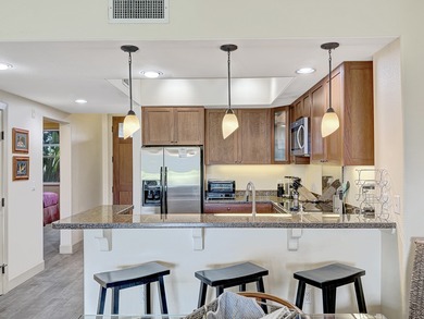 This ground-floor villa sits right on the golf course in Hali'i on Waikoloa Beach Resort Golf Course in Hawaii - for sale on GolfHomes.com, golf home, golf lot