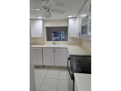 Bright & Spacious Corner Unit with Water Views-Investor on Colony West Country Club in Florida - for sale on GolfHomes.com, golf home, golf lot