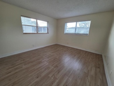 Bright & Spacious Corner Unit with Water Views-Investor on Colony West Country Club in Florida - for sale on GolfHomes.com, golf home, golf lot