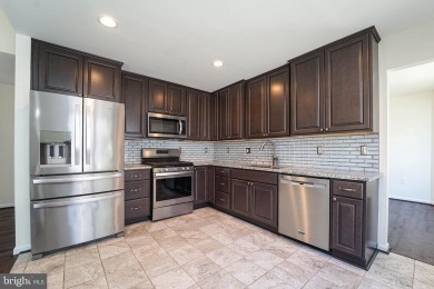 This charming brick and siding single-family home offers the on Heritage Harbour Golf Club in Maryland - for sale on GolfHomes.com, golf home, golf lot